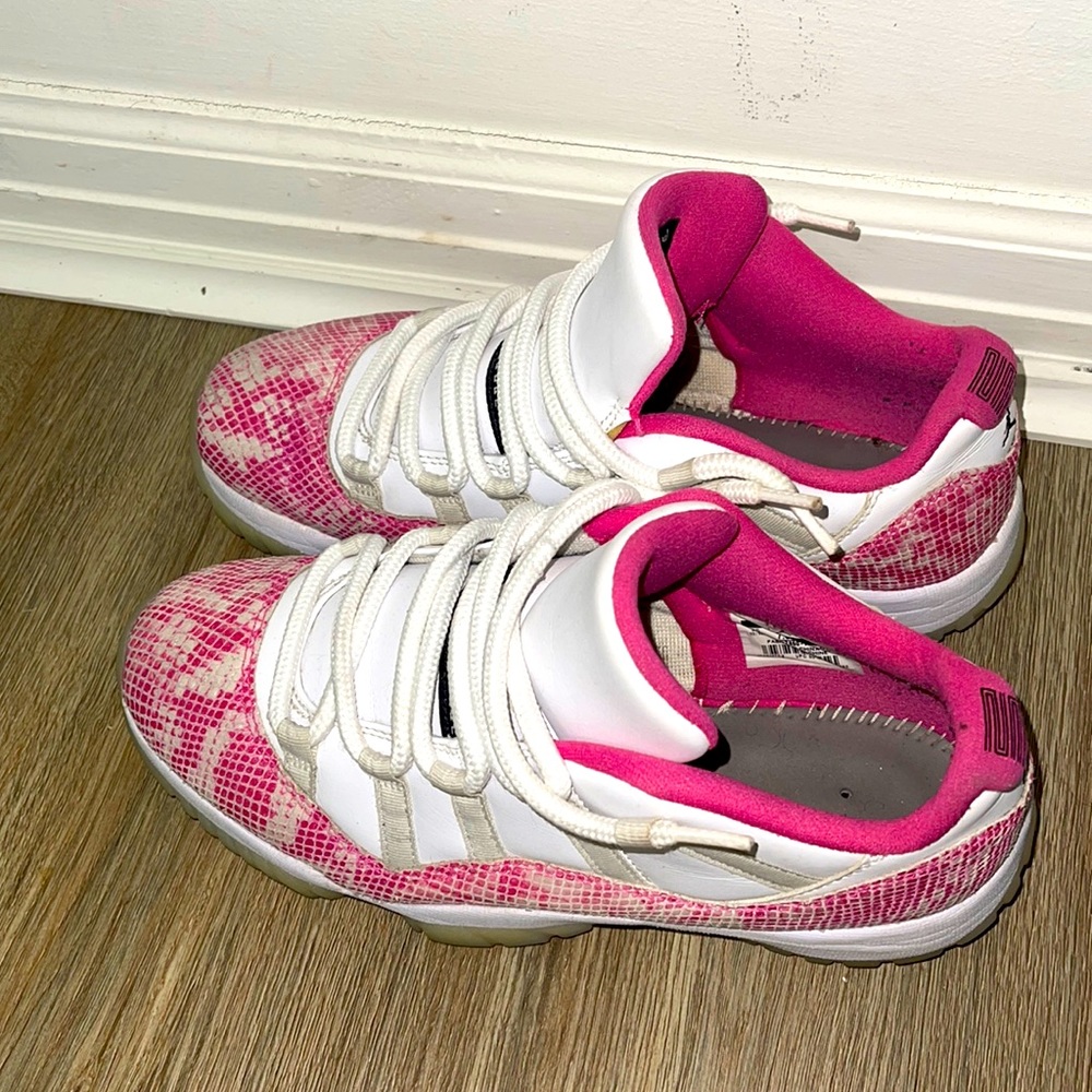 Pink Jordan 11s low snakeskin without the box and sole